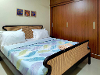 Bedroom one of TS No 17/1 TrustedStay Service Apartment in Banjara Hills Hyderabad